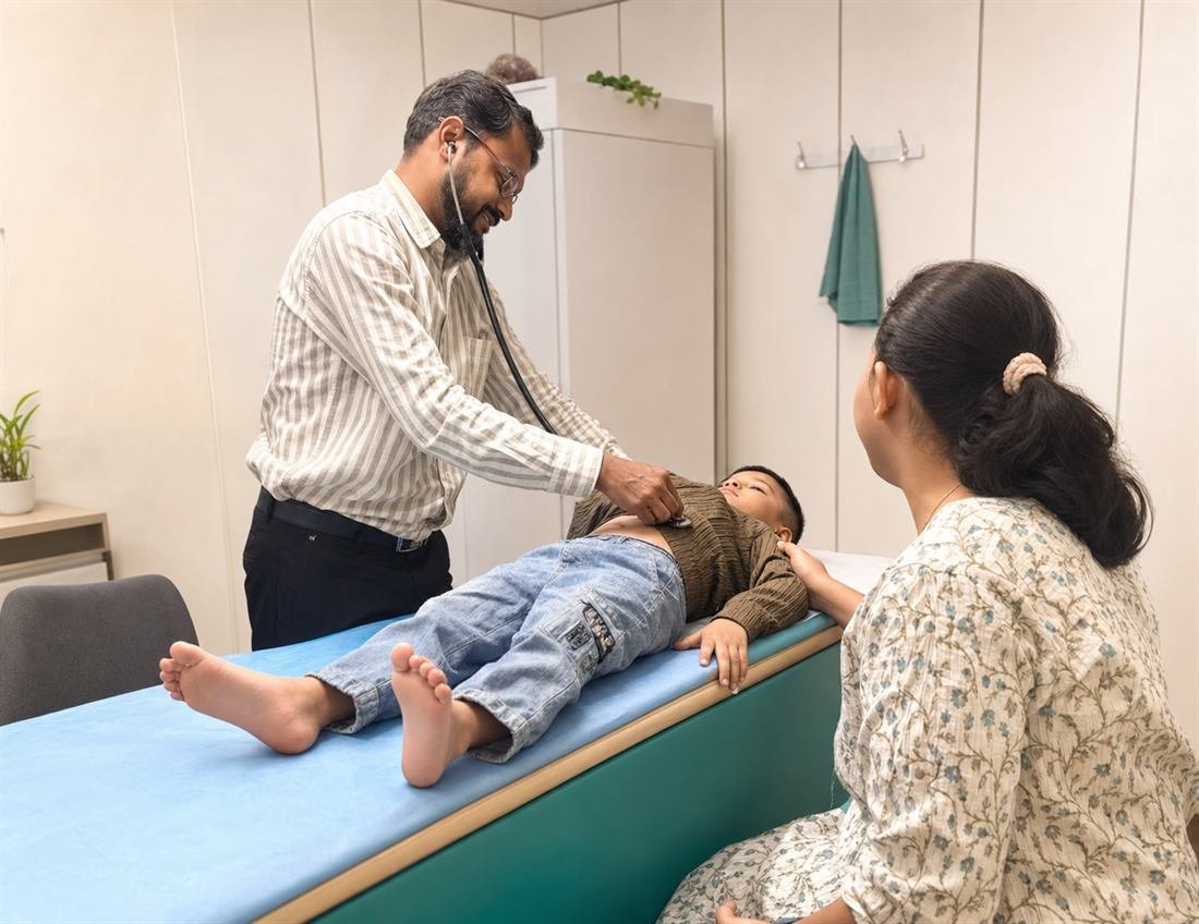Dr. Ninad Mahale examining a child with a stethoscope at Eira Clinic For Children